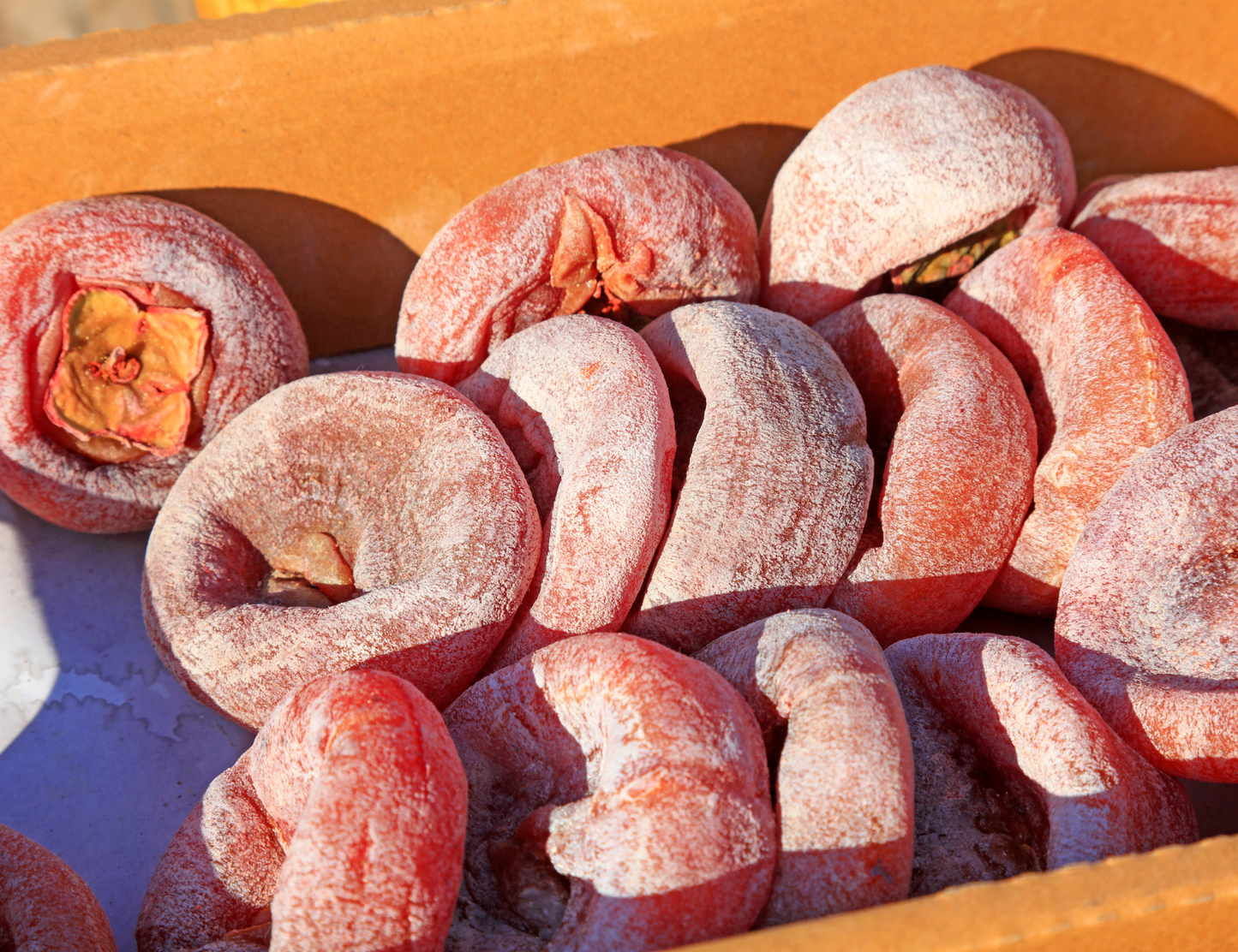 image of dried persimmons in box