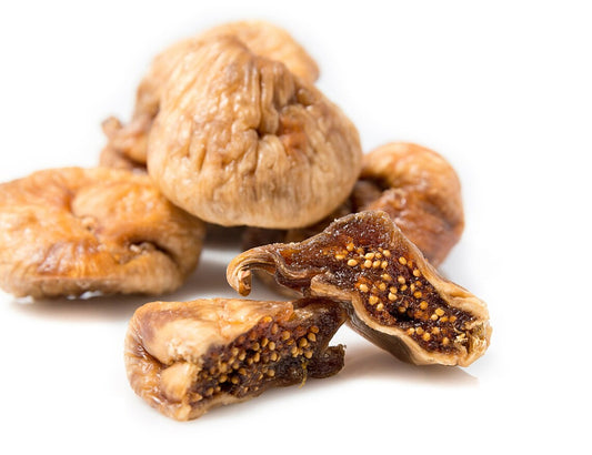 "A close-up of plump and tender dried figs, a delicious and nutritious snack with a rich, sweet flavor."